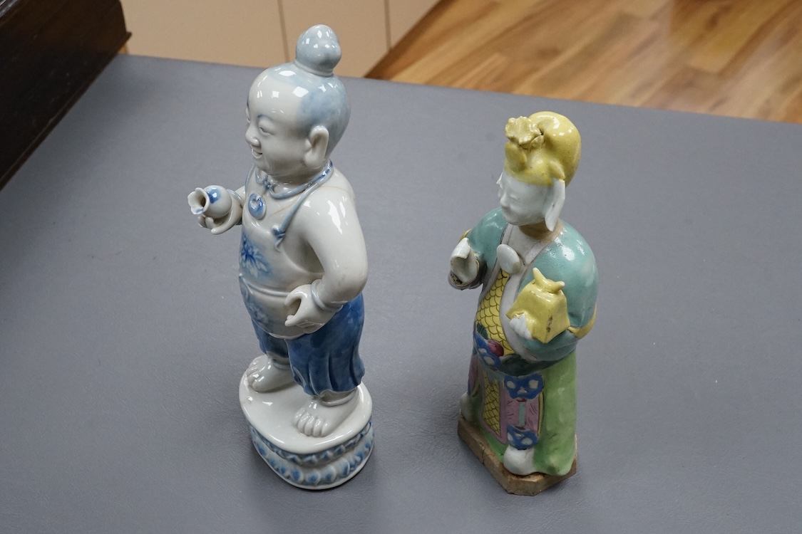 A Chinese enamelled porcelain figure of an immortal, Jiaqing period and a Japanese blue and white figure, tallest 20.5cm